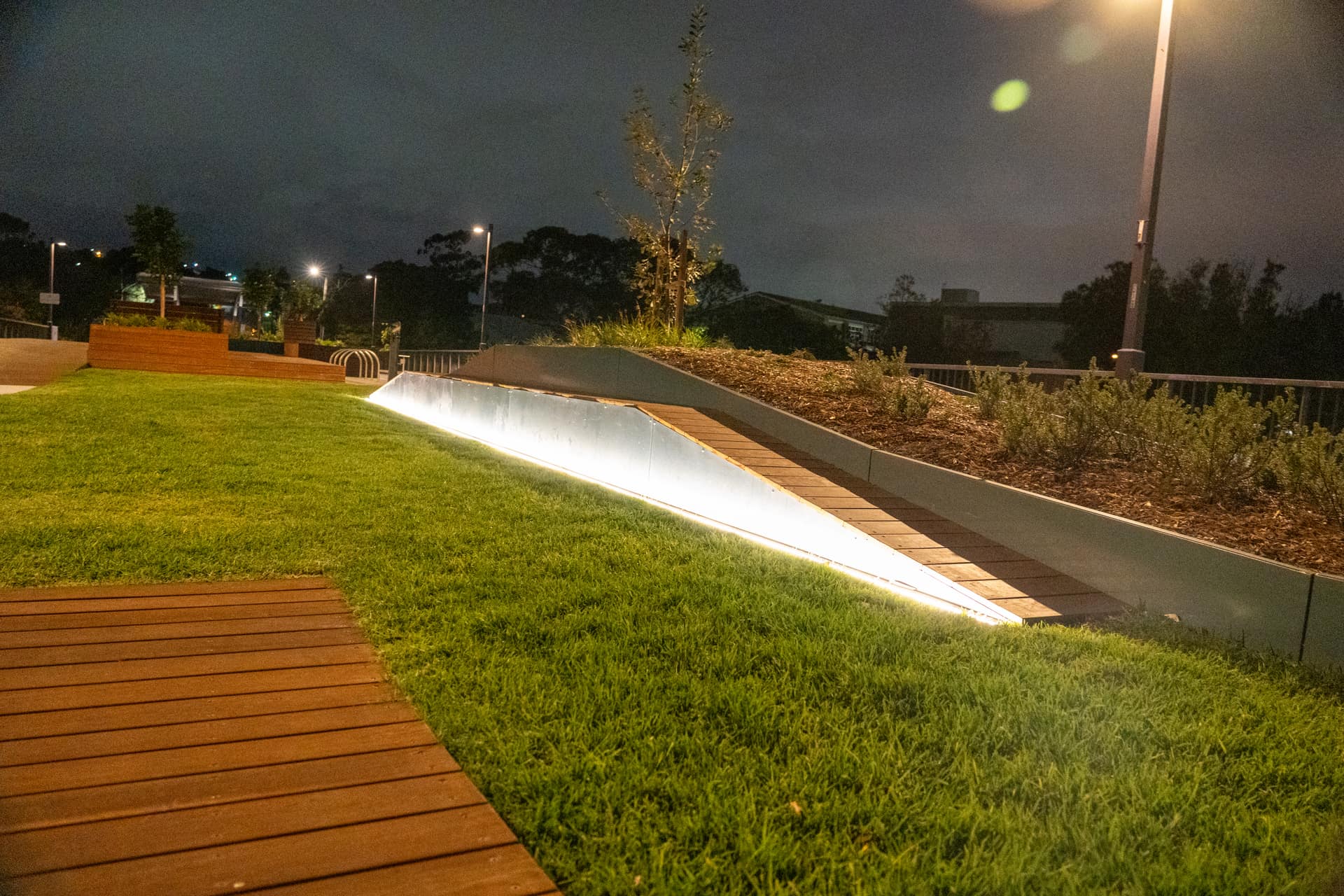 Public space lighting installed by Thorntek, photographed at dusk