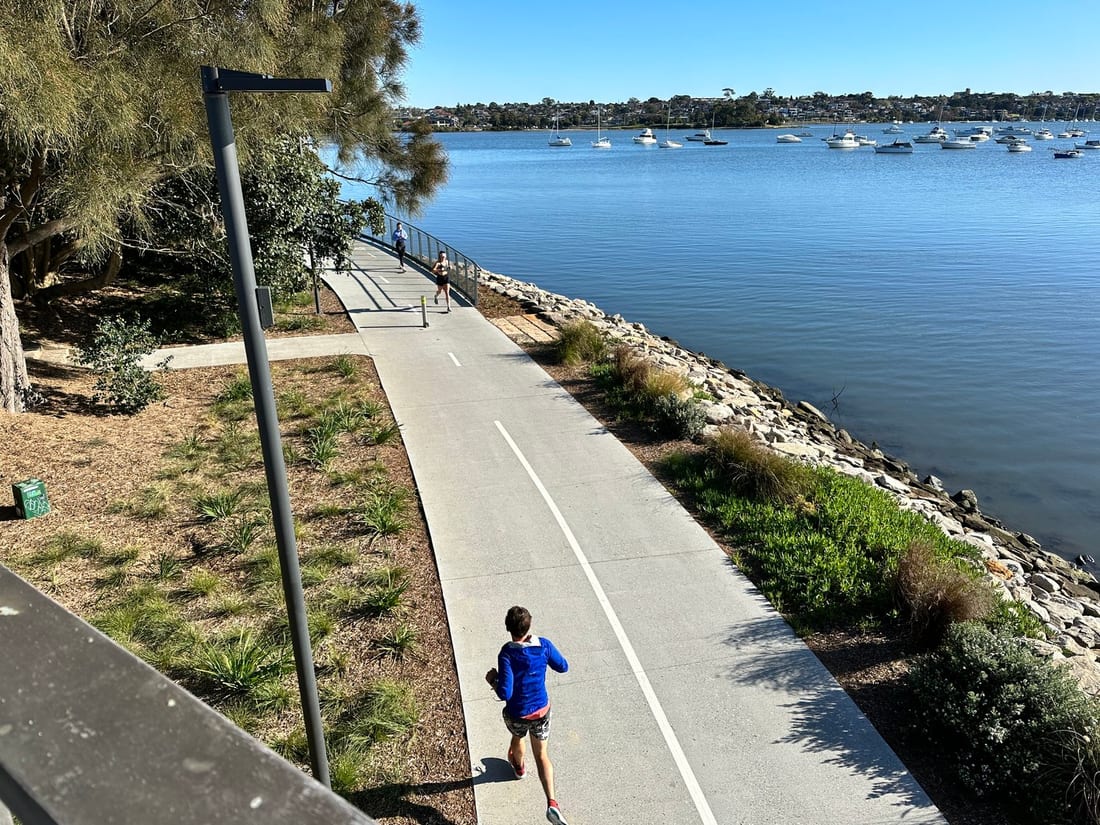 New pathway lighting along the Bay Run shared path beside the bay