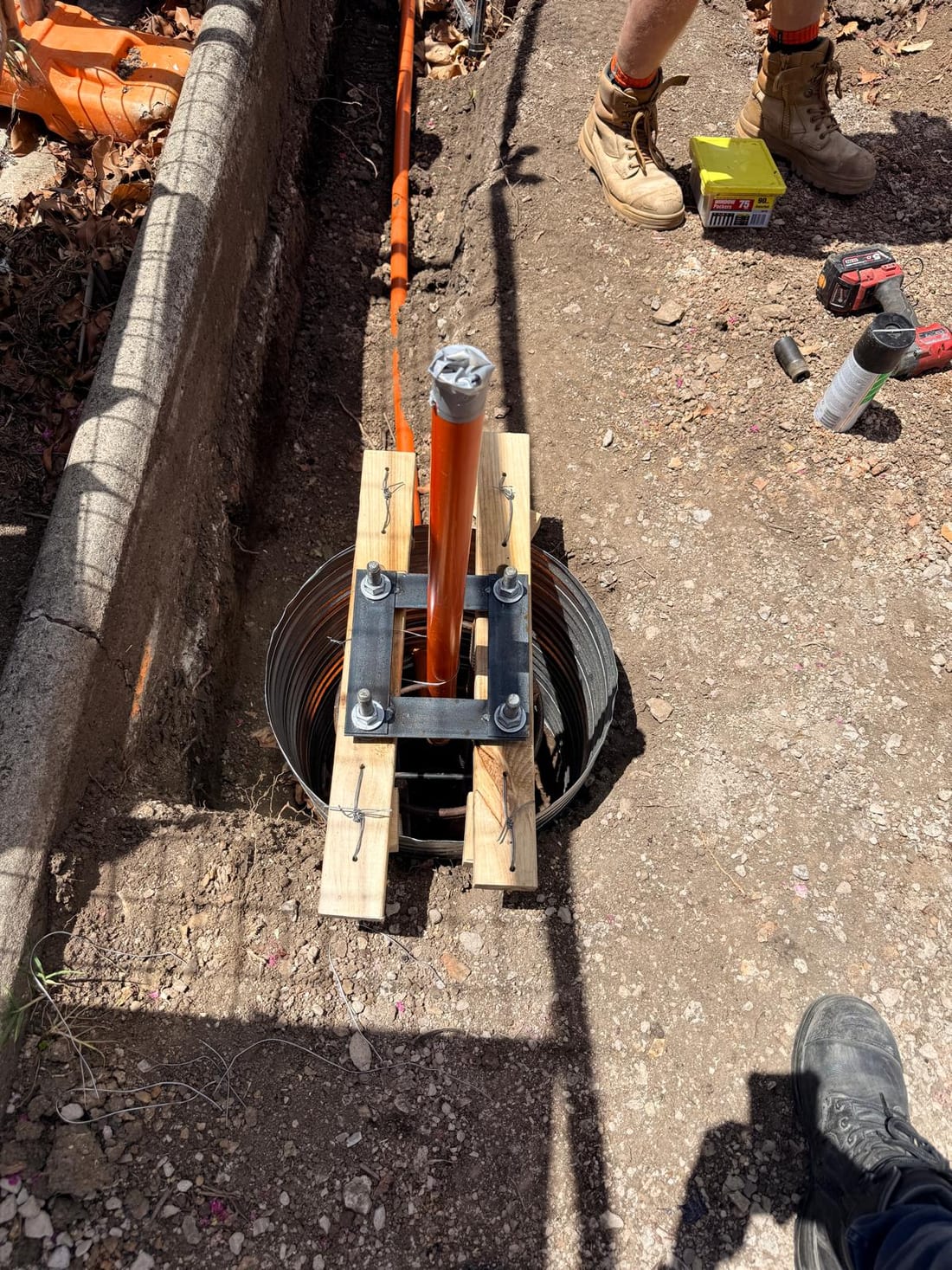Cable fed into an underground pit during the Yeo Park lighting installation