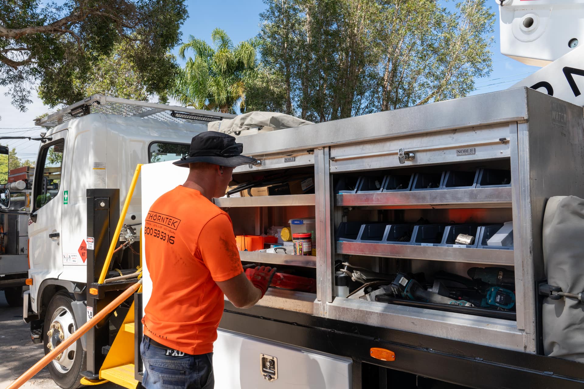 Thorntek electrician at a fully equipped service truck on a Sydney job